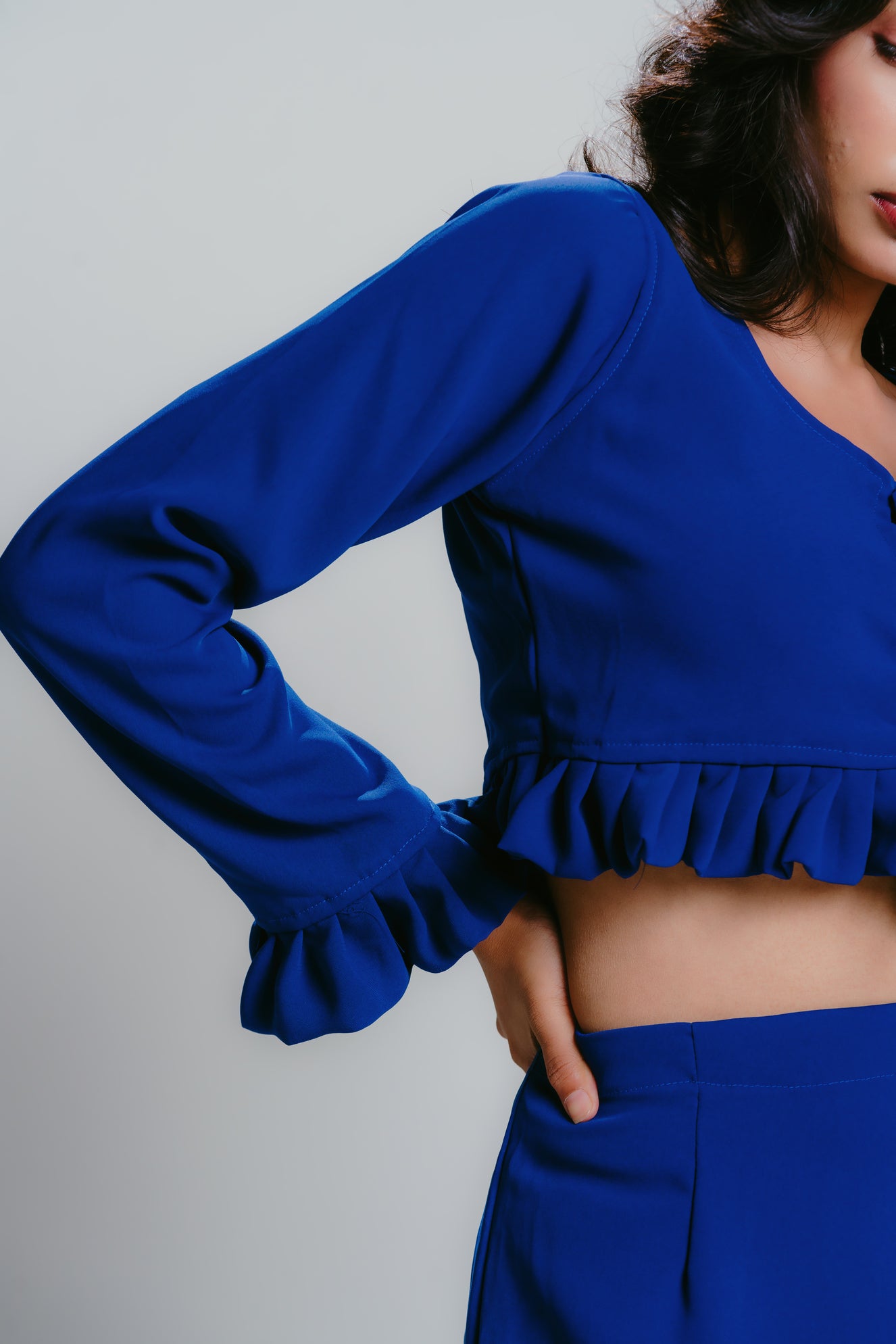 Blue smock crop top with pleats and tie-up details