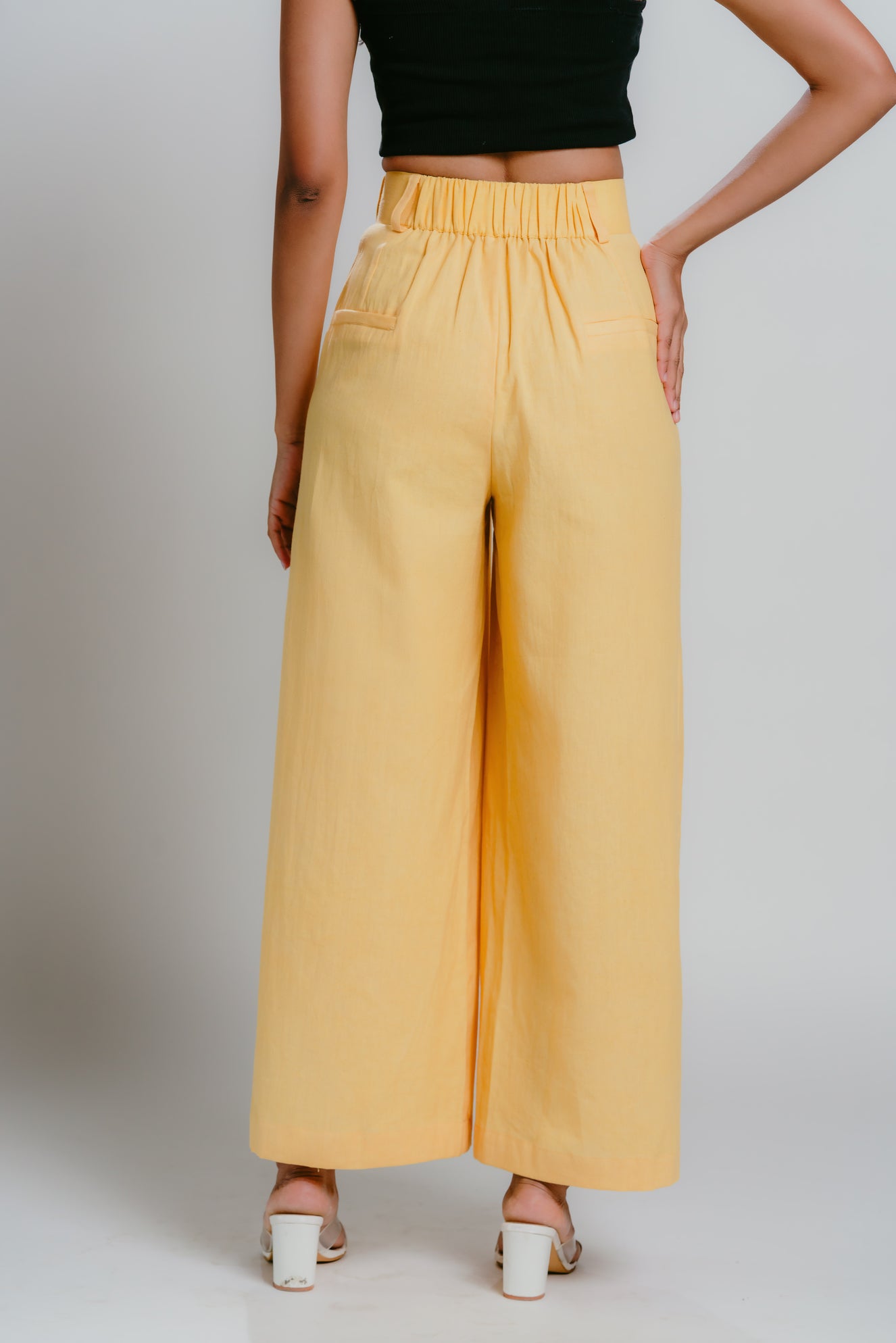 Yellow wide-leg pants with elasticated waistband