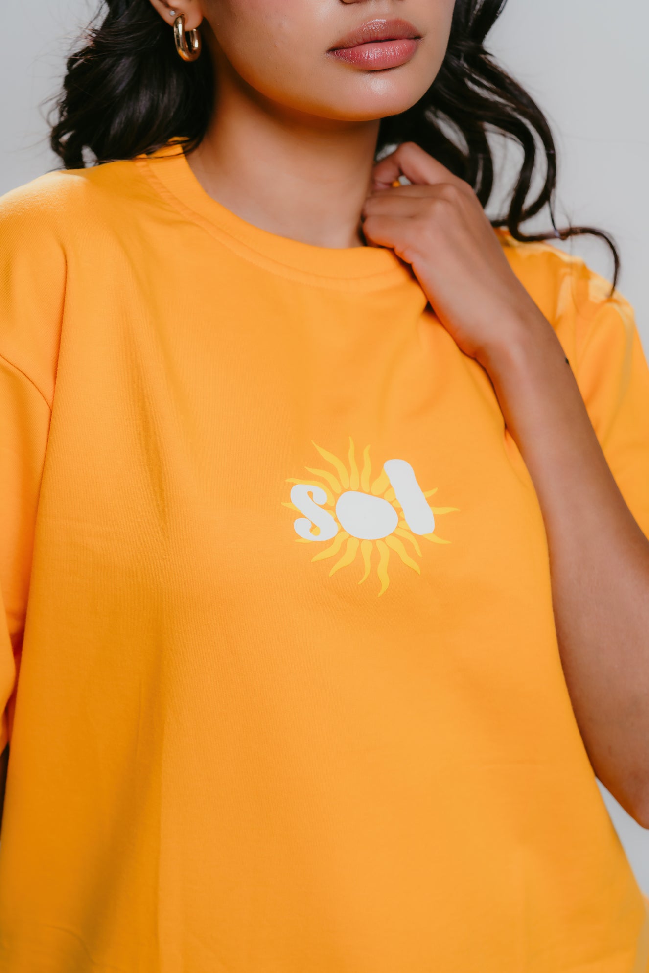 Unisex orange t-shirt with sol print logo