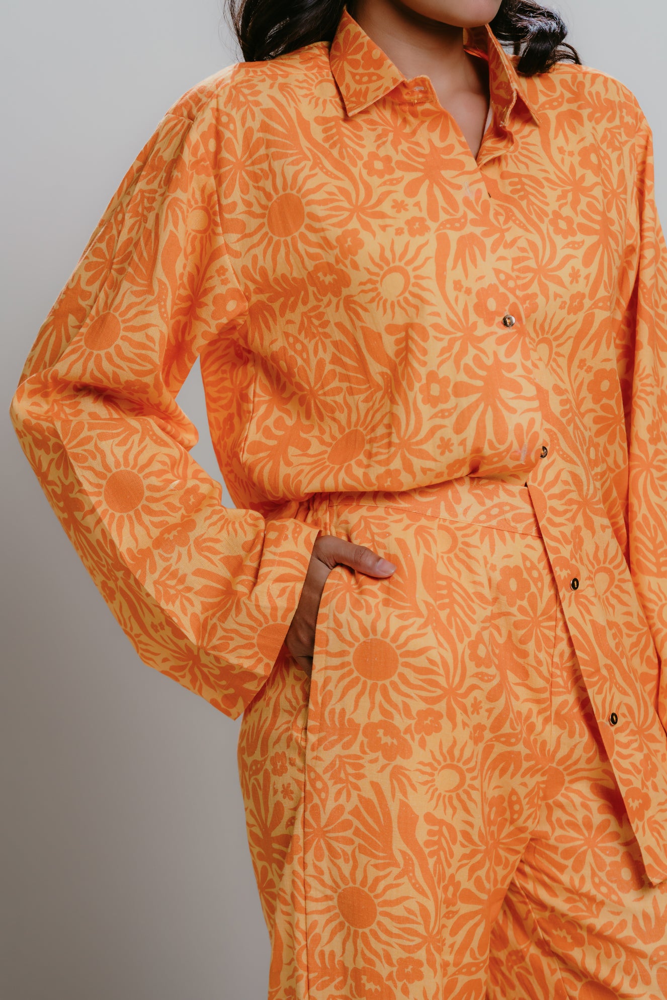 Orange printed pants with pockets