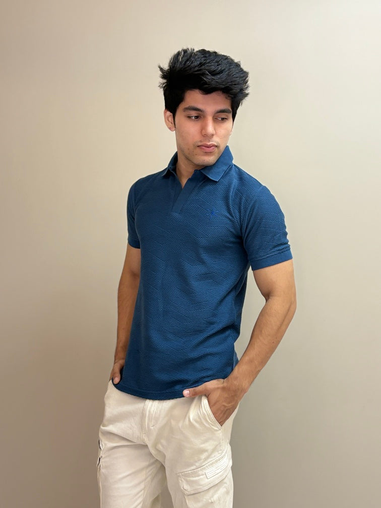 Polo T-shirt with a sun embroidery detail and textured fabric