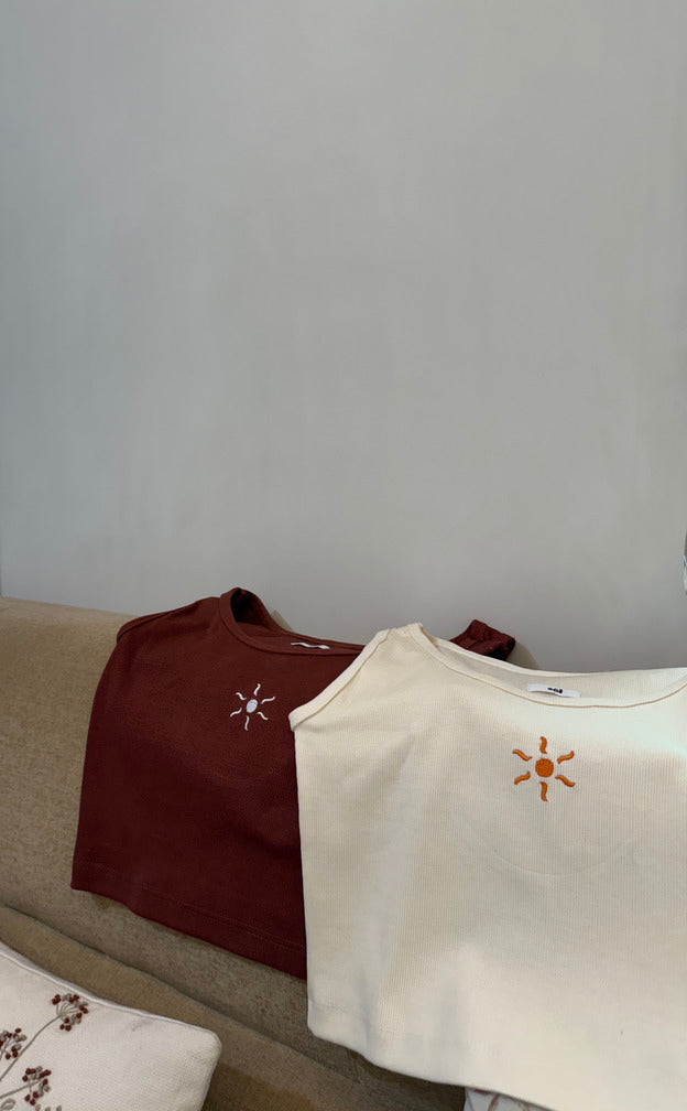 Crop tank tops, with embroidered sun details